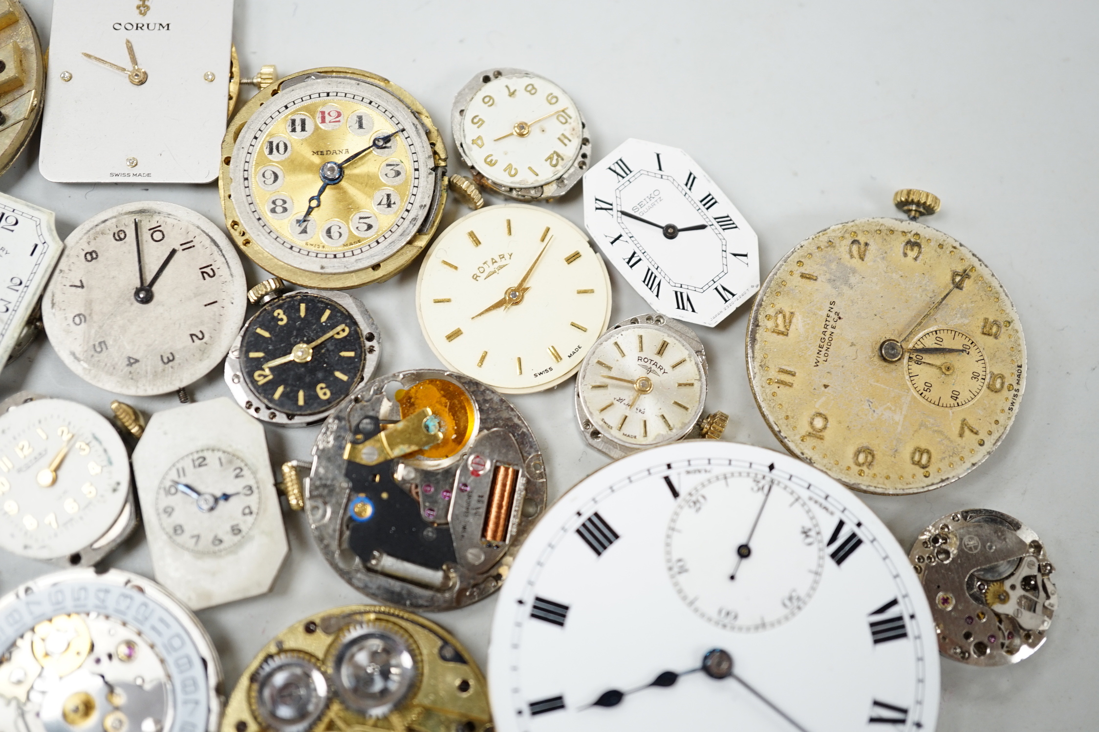 A quantity of assorted wrist and pocket watch parts and movements.